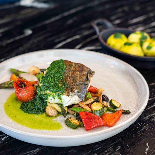 PRIME Restaurant Ahlbeck Fried Baltic Sea cod on Mojo Verde with grilled market vegetables